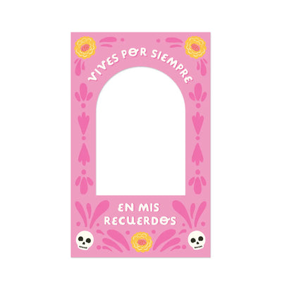 Pink Día De Los Muertos photo frame magnet with marigolds, skulls, and the phrase “Vives por siempre en mis recuerdos.”
