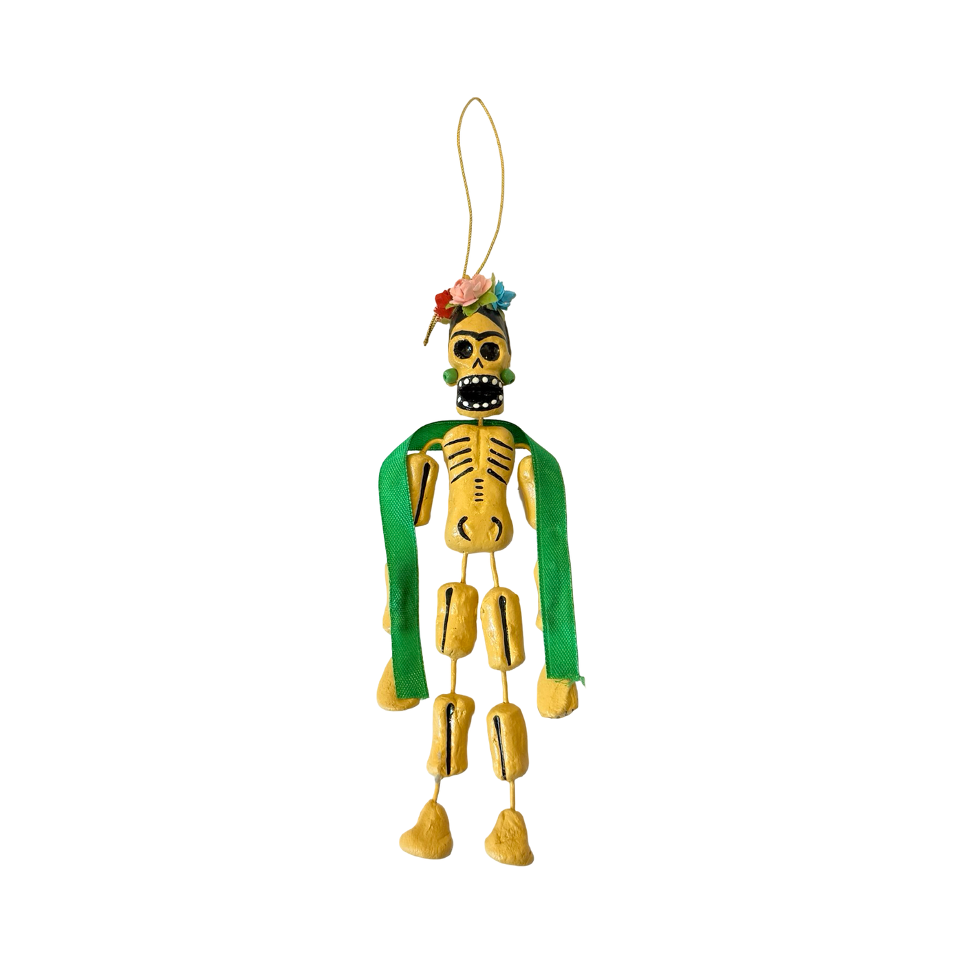 Handmade Día de Muertos skeleton ornament inspired by Frida Kahlo, featuring a colorful flower crown, green shawl, and dangling limbs.