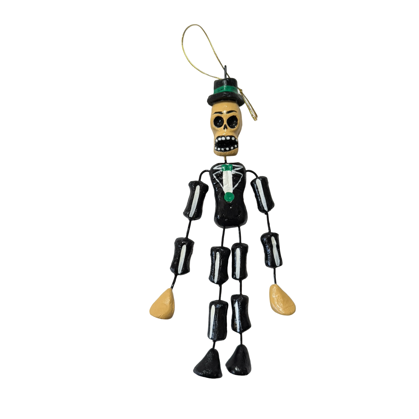 Handmade Día de Muertos skeleton Catrín ornament wearing a black suit, green tie, and green top hat with dangling limbs.