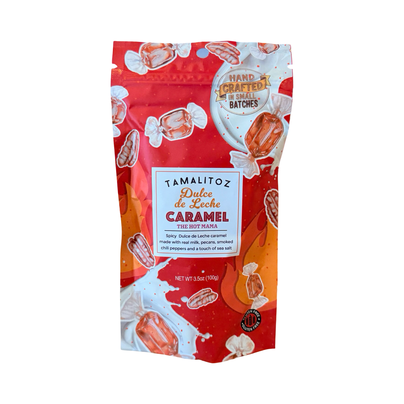 Red stand-up pouch of Tamalitoz “Dulce de Leche Caramel – The Hot Mama,” decorated with pecans, wrapped caramels, and flame graphics; label notes real milk, pecans, smoked chili peppers, and sea salt; 3.5 oz