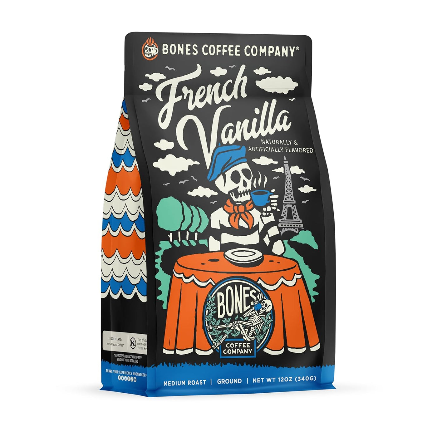 Bones Coffee Company French Vanilla coffee bag, black background with colorful artwork of a skeleton in a beret enjoying coffee at a Parisian café table, Eiffel Tower in the background, with text reading “French Vanilla Flavored Coffee.”