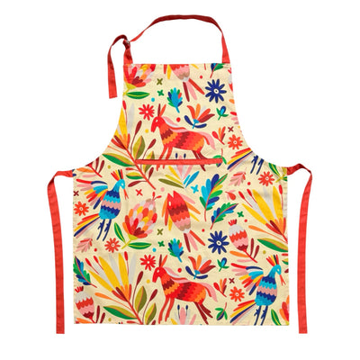 Apron featuring a multi-colored Mexican otomi design with orange neck and waist ties.
