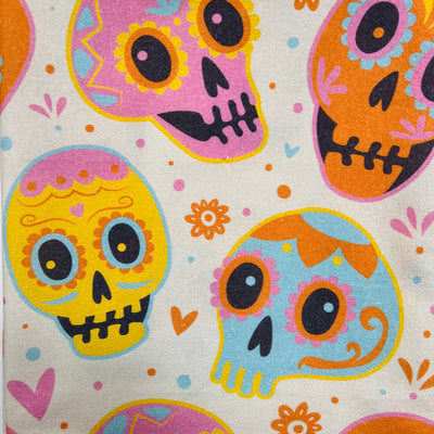 close up view of  a pastel colored sugar skulls design