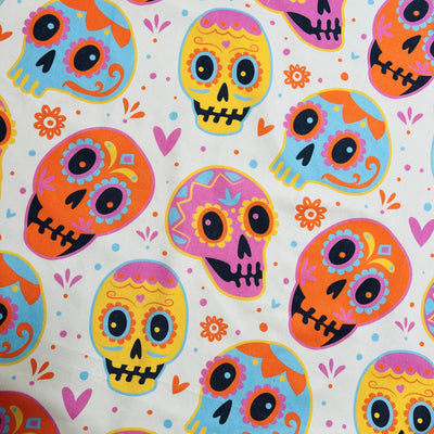 close up view of a pastel colored sugar skulls design