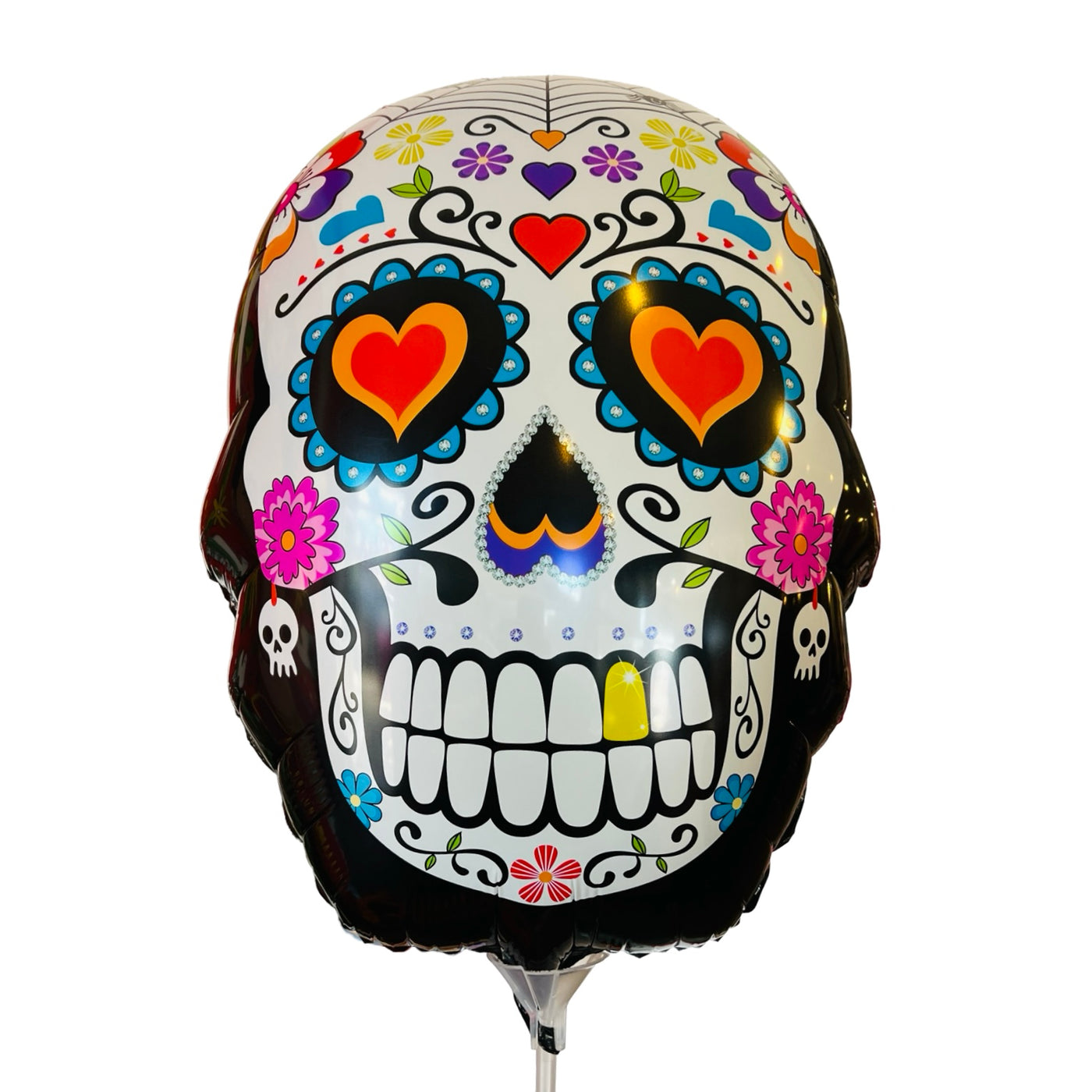 black Sugar Skull shaped mylar balloon with a traditional sugar skull and floral design