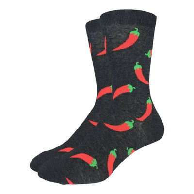 Dark charcoal socks with a repeating pattern of bright red chili peppers with green stems.