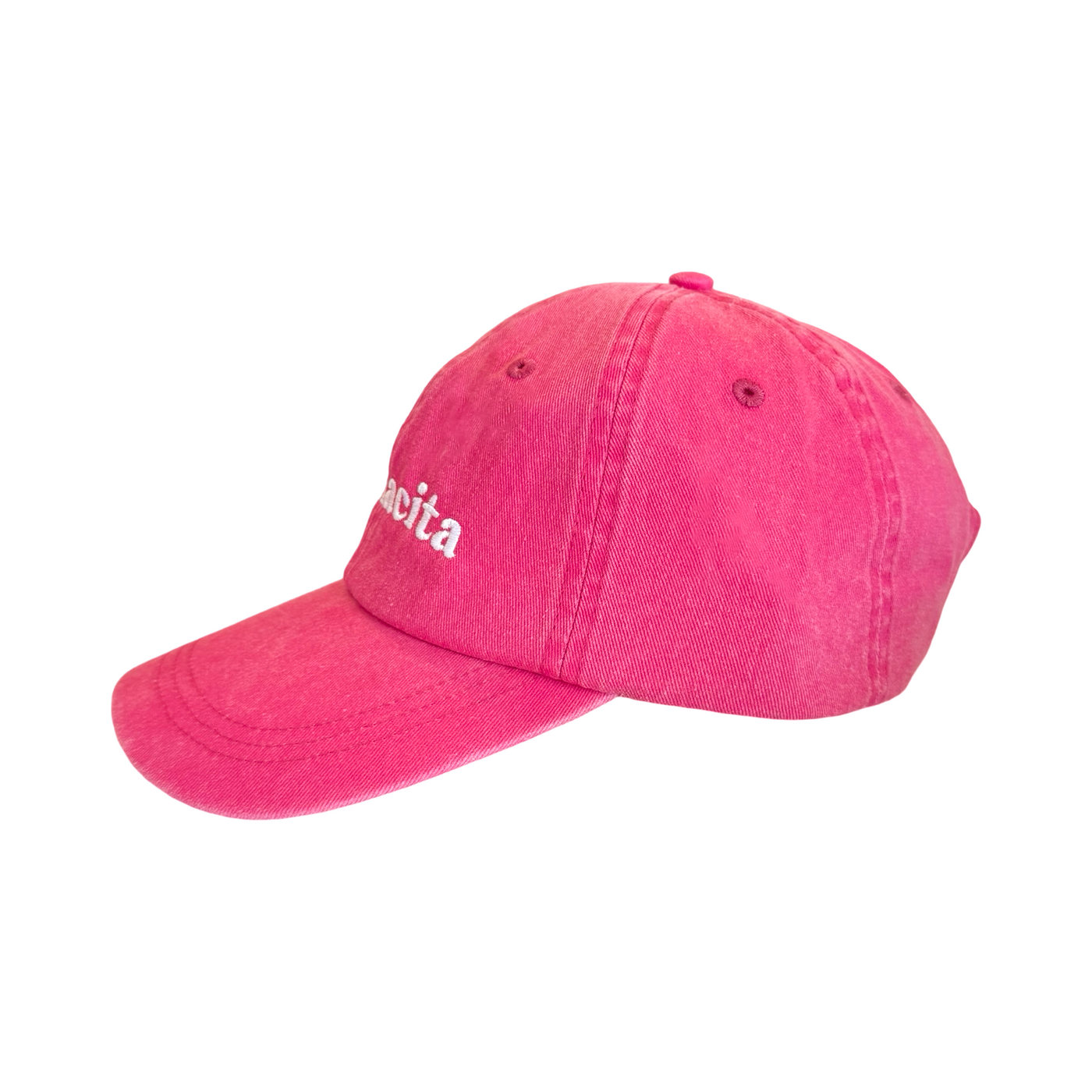 side view of a pink hat with the word mamacita in white lettering