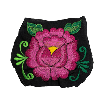 Woven plum flower embroidered on black fabric.