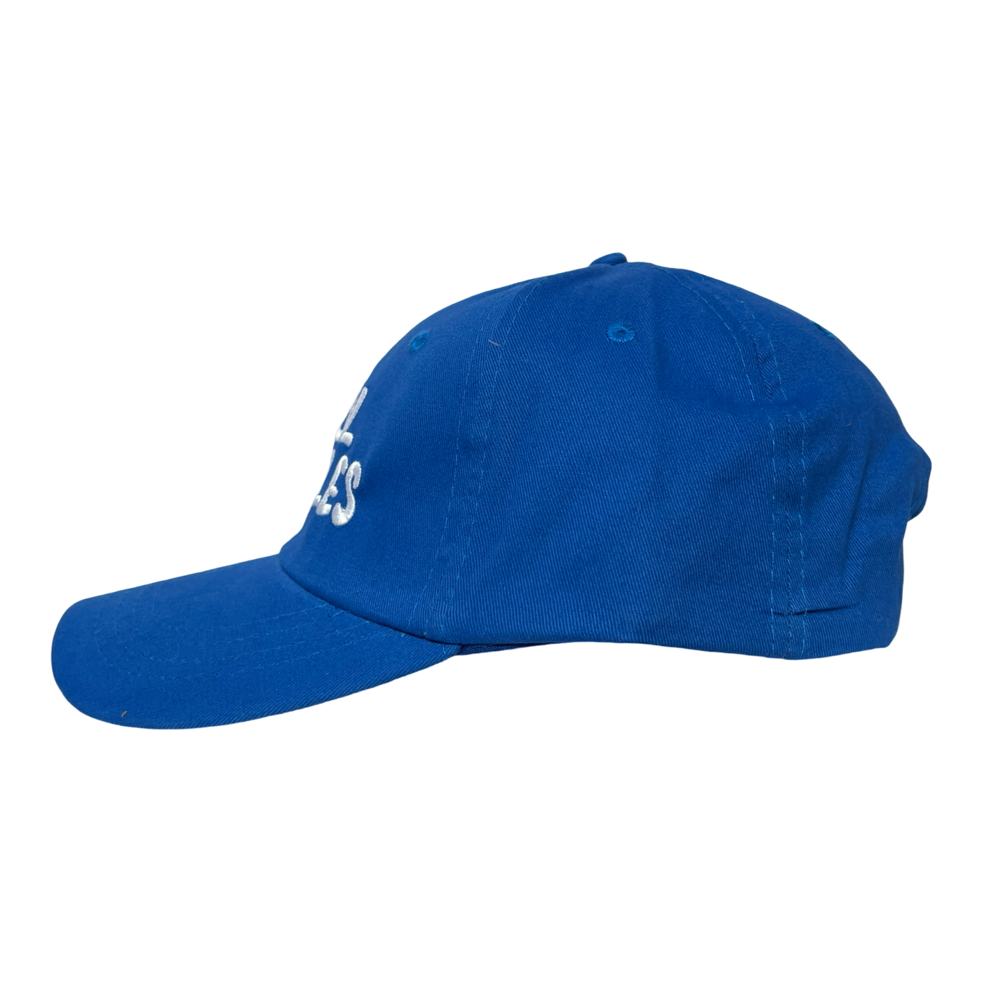 side view of a blue hat with the phrase cool frijoles in white lettering