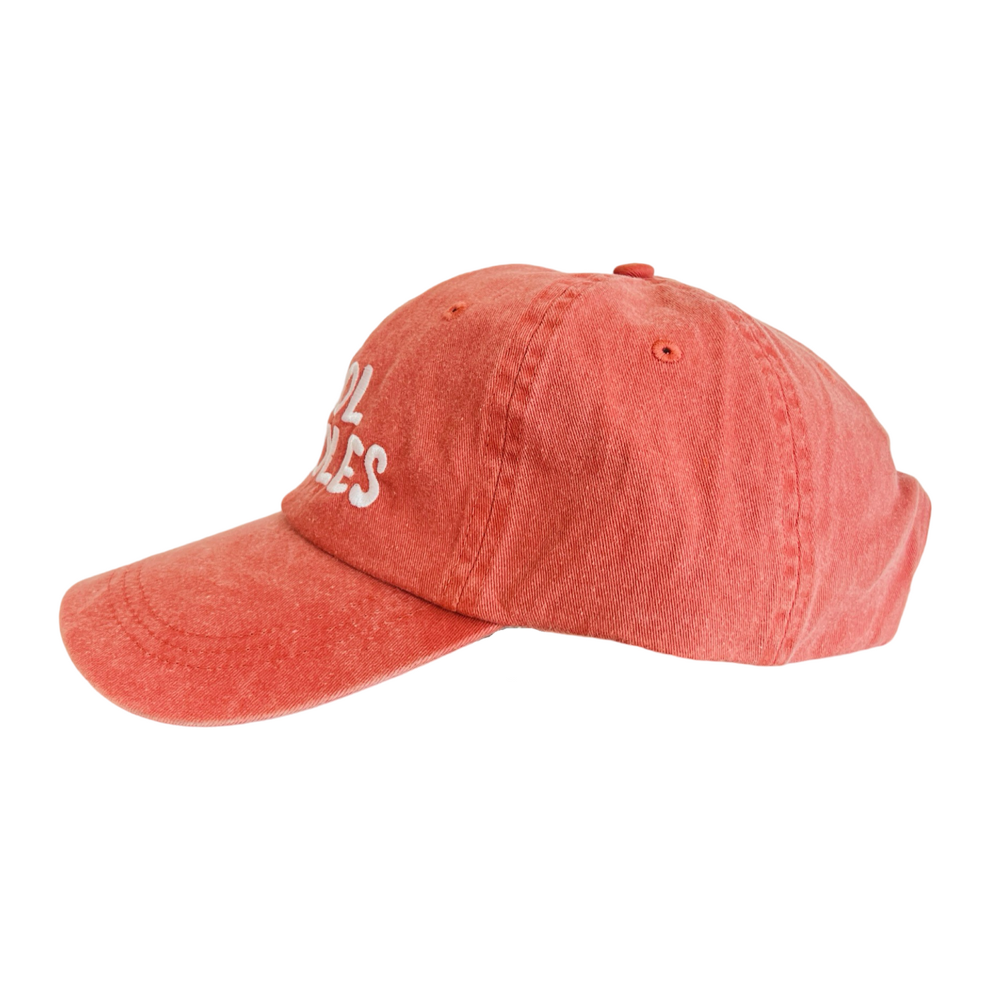 side view of a coral hat with the phrase cool frijoles in white lettering