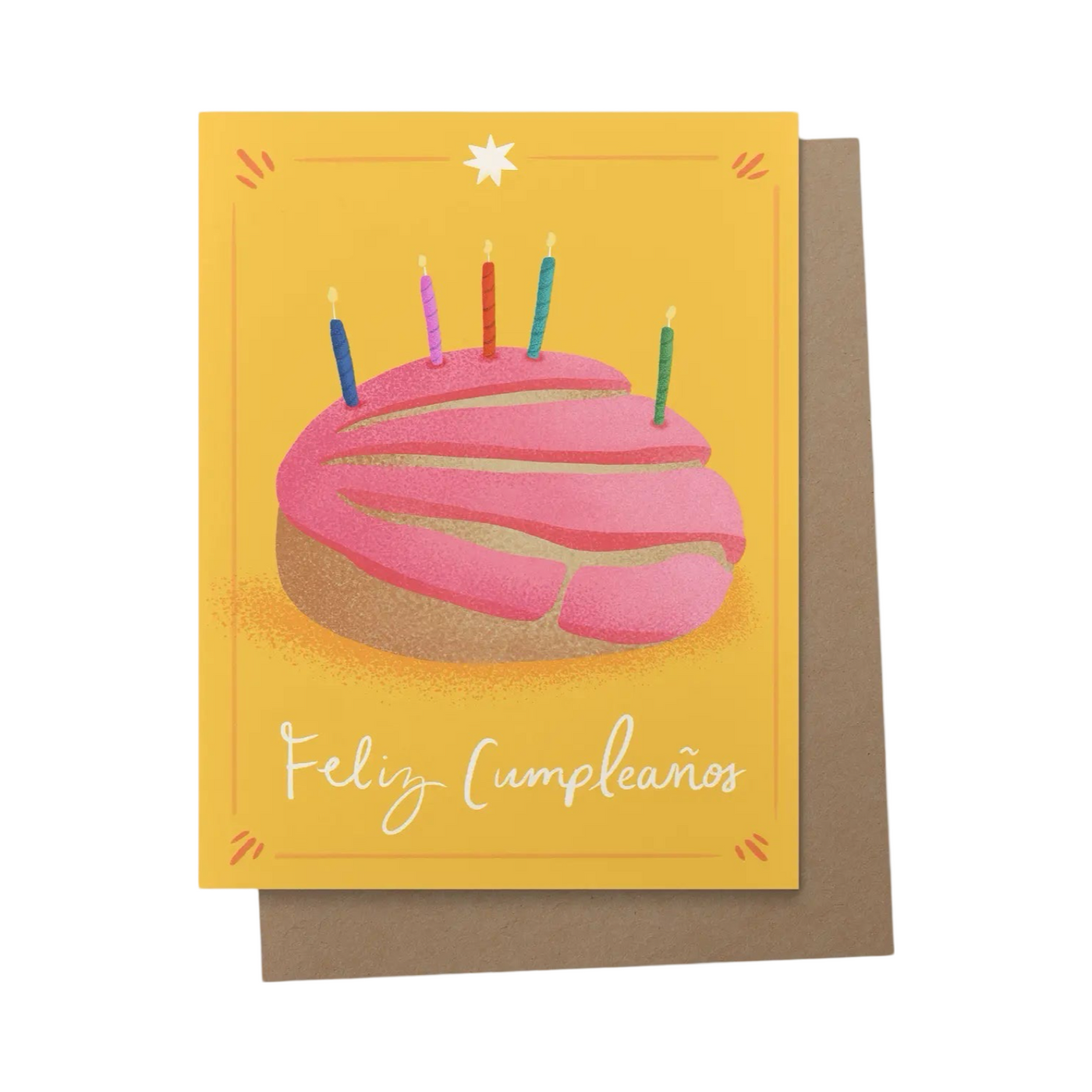 front of greeting card featuring a gold background with colorful birthday candles sticking out of a pink concha. Text reads "feliz cumpleaños"