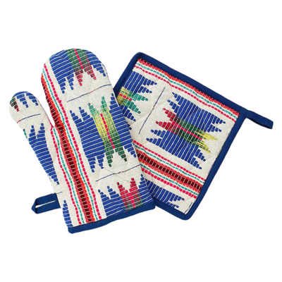 cream colored oven mitt and pot holder set with a blue, red and yellow/green tribal design.