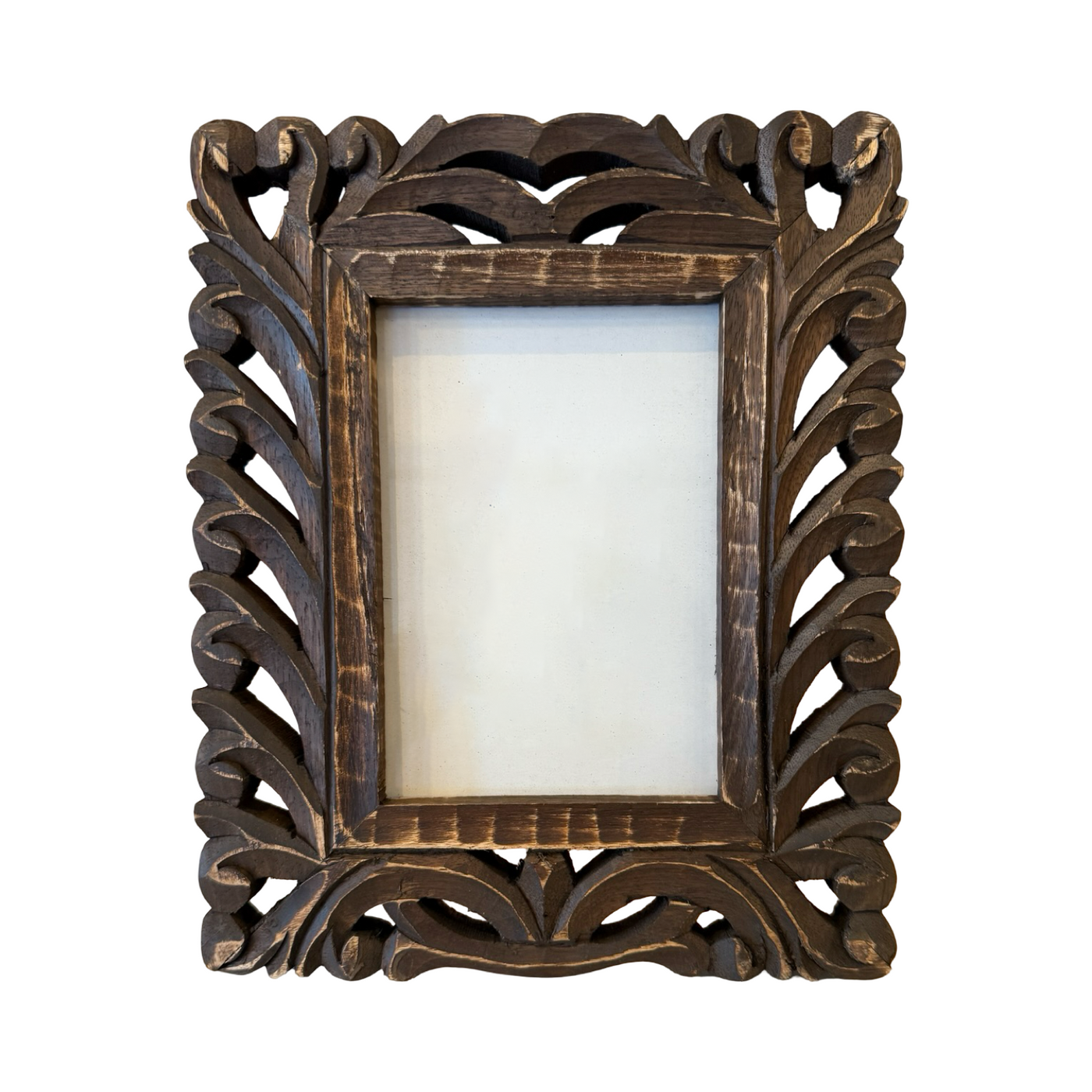 wooden photo frame that features a hand carved design