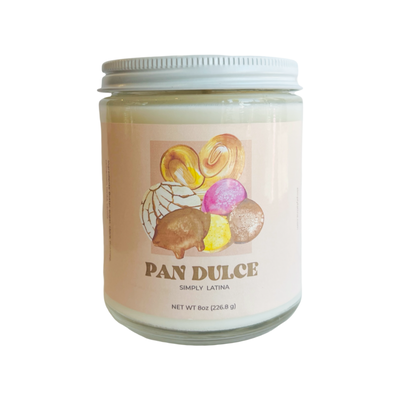 8 oz clear vessel candle with a branded label that features various Mexican pastries and a white lid.