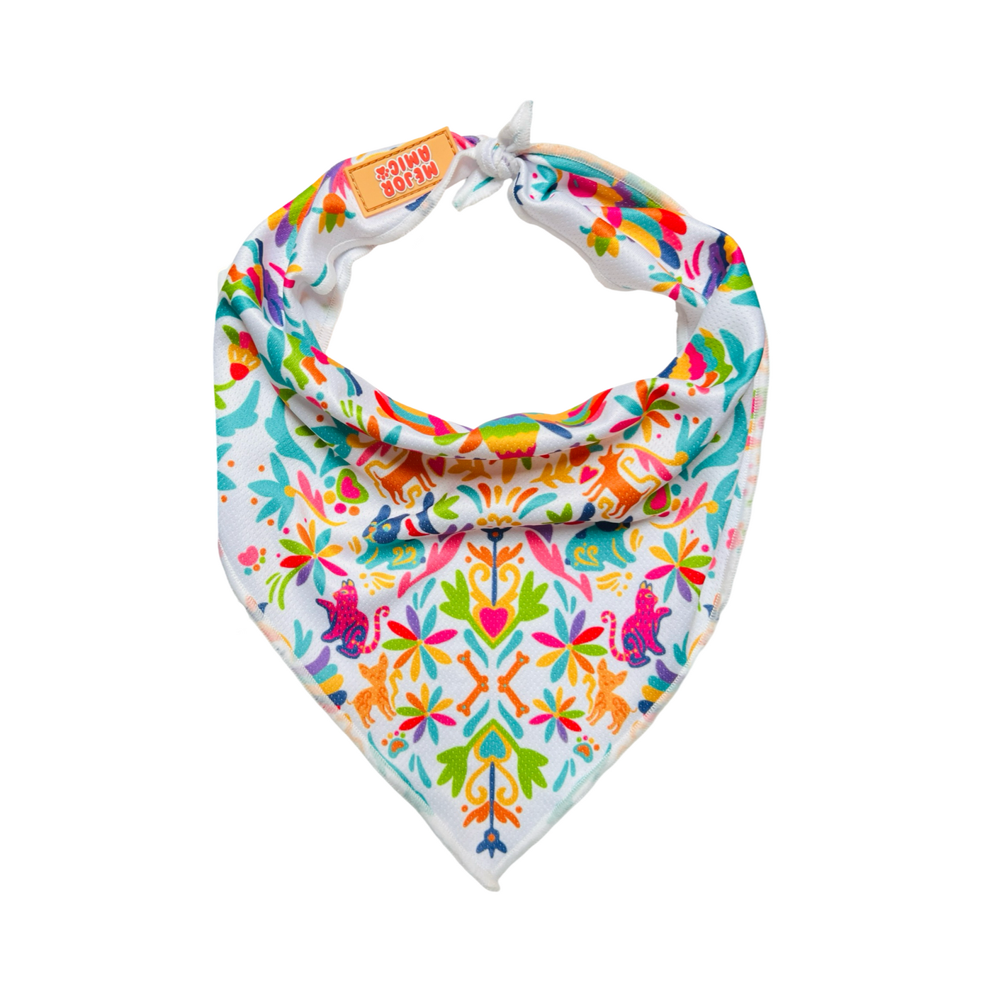 white dog bandanda featuring a multi-color design that has animals, bones and flowers inspired by the otomi design.