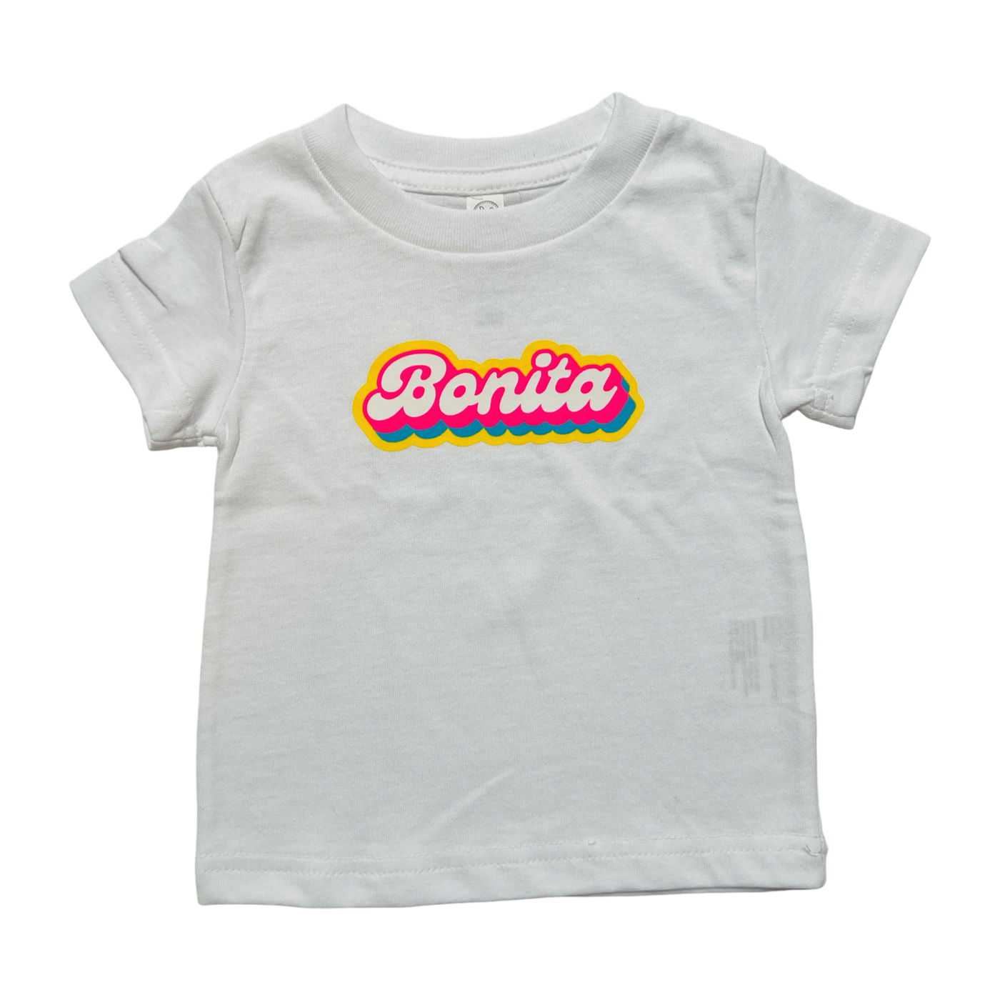 white infant shirt with the word bonita in white lettering outlined in yellow, pink and blue