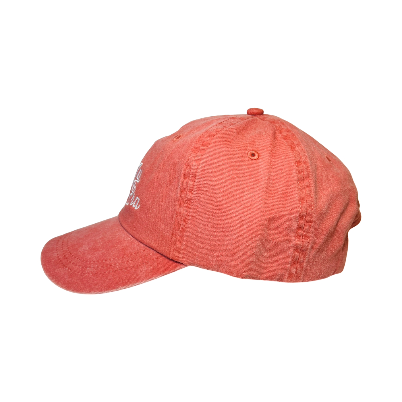 side view of a coral hat with the phrase In My Señora Era in white lettering