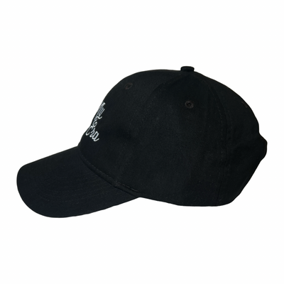 side view of a black hat with the phrase in my señora era in white lettering