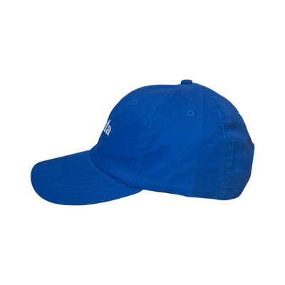 Side view of a royal blue hat with the phrase La Jefa in white lettering