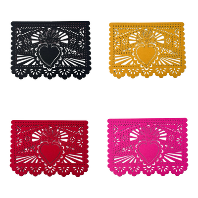 4 multicolored felt papel picado inspired placemat that features a sacred heart design