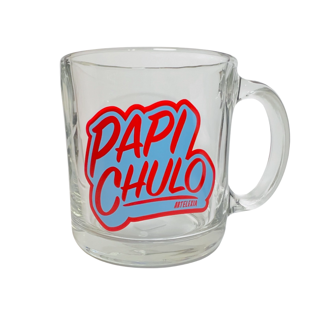Clear glass mug with the phrase Papi Chulo in red lettering outlined in light blue.