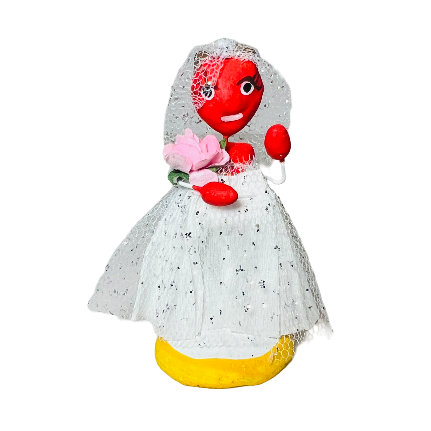 red diablita figurine in a wedding dress