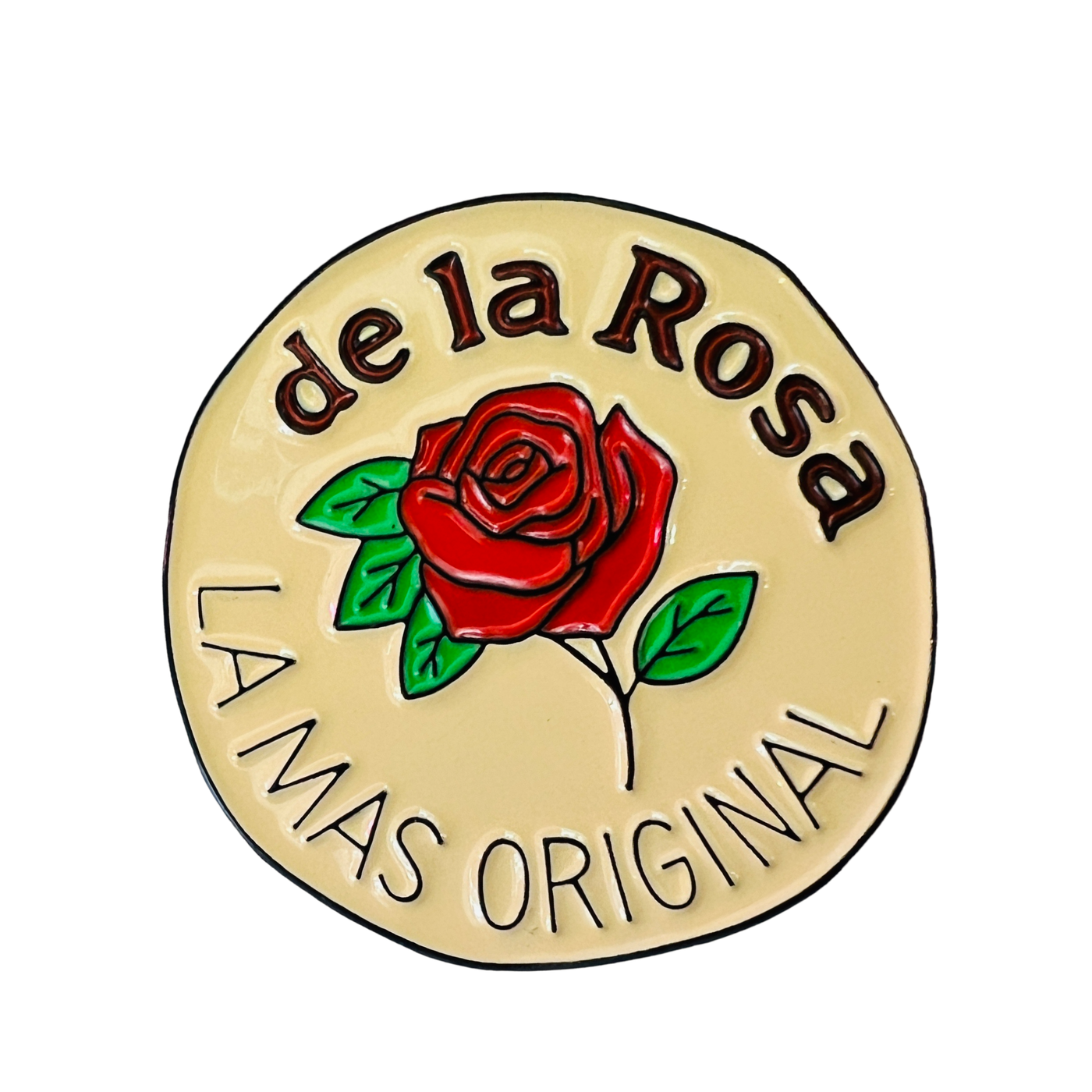 round beige enamel pin of a de la rosa candy that features a red rose in the center