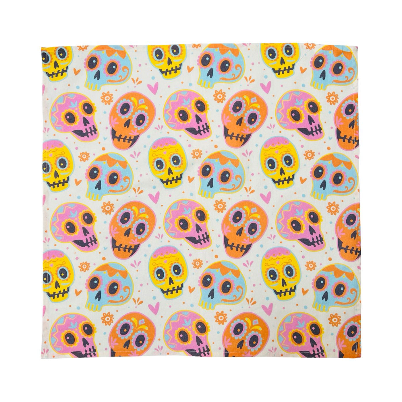 square cream kitchen towel with a pastel colored sugar skulls design