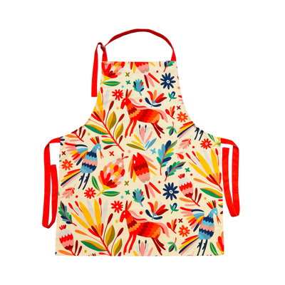 Apron featuring a multi-colored Mexican otomi design with orange neck and waist ties.