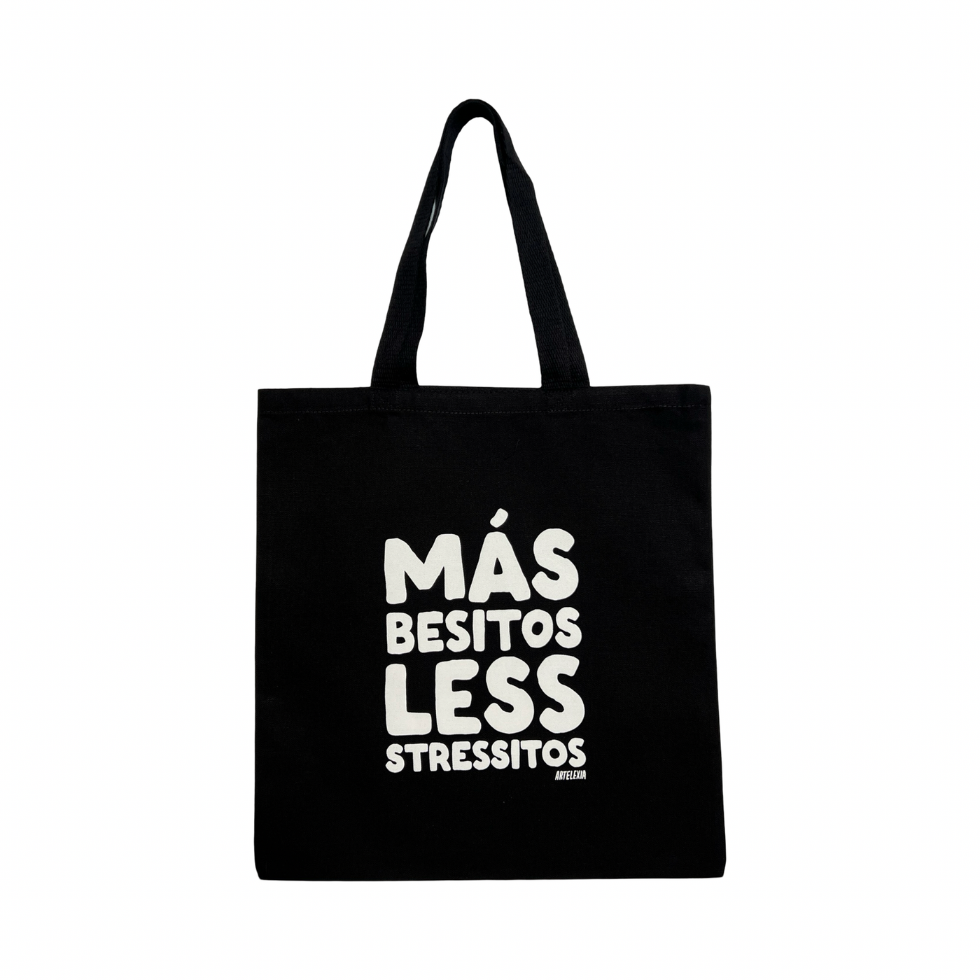 black tote bag with the phrase Mas Besitos Less Stressitos in white lettering