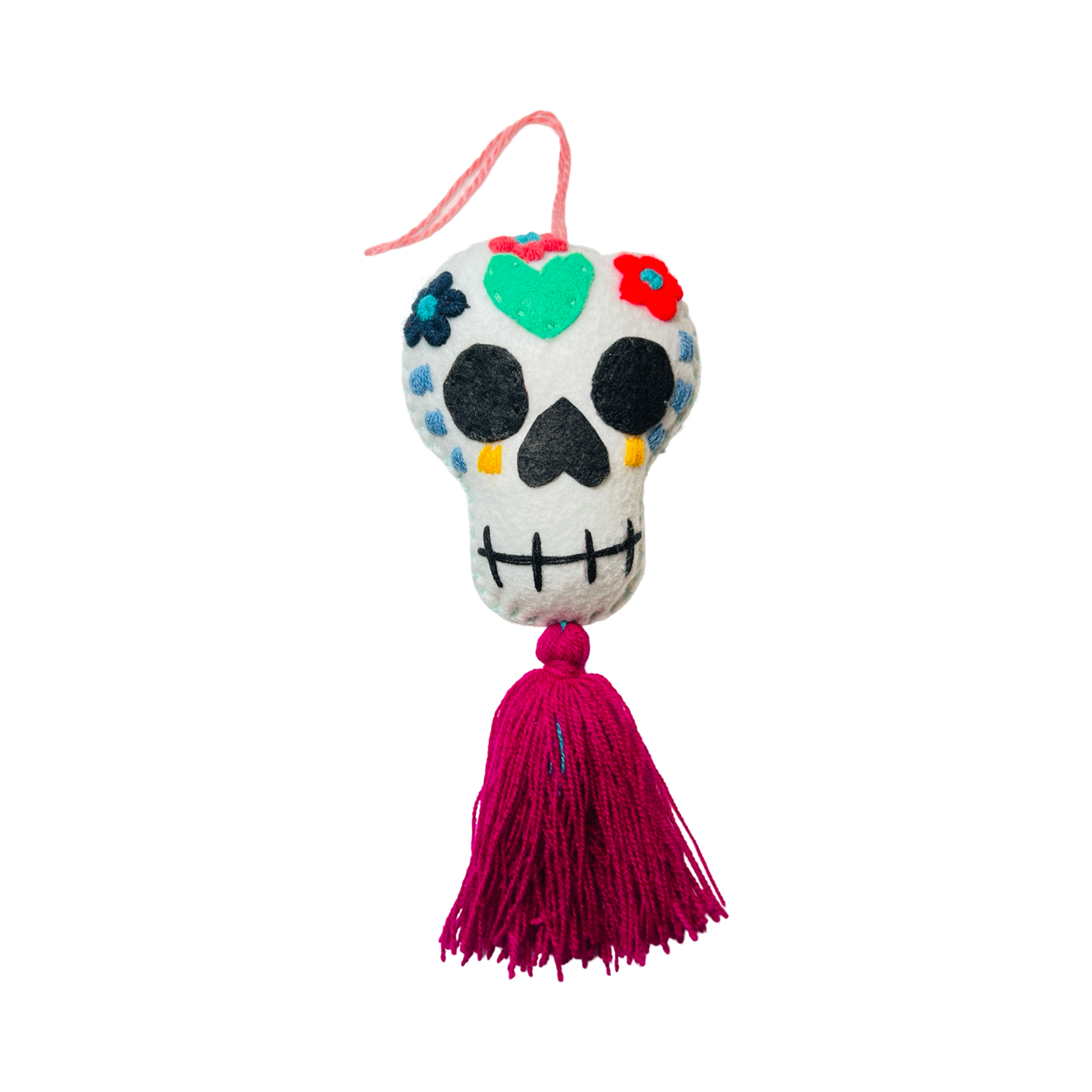 white sugar skull felt ornament with a fuchsia tassel