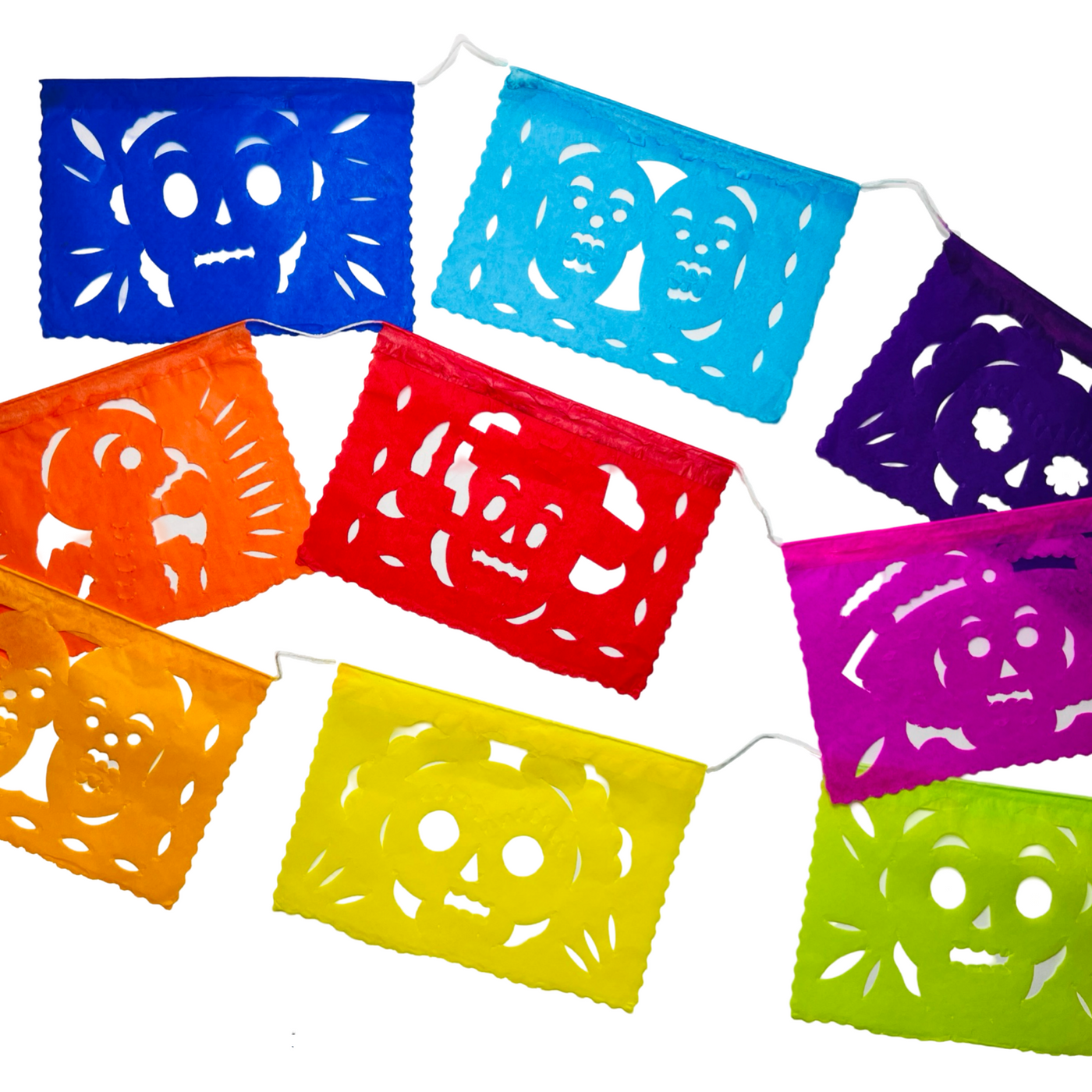 multicolor papel picado tissue paper flags attached to a white string with various skull designs