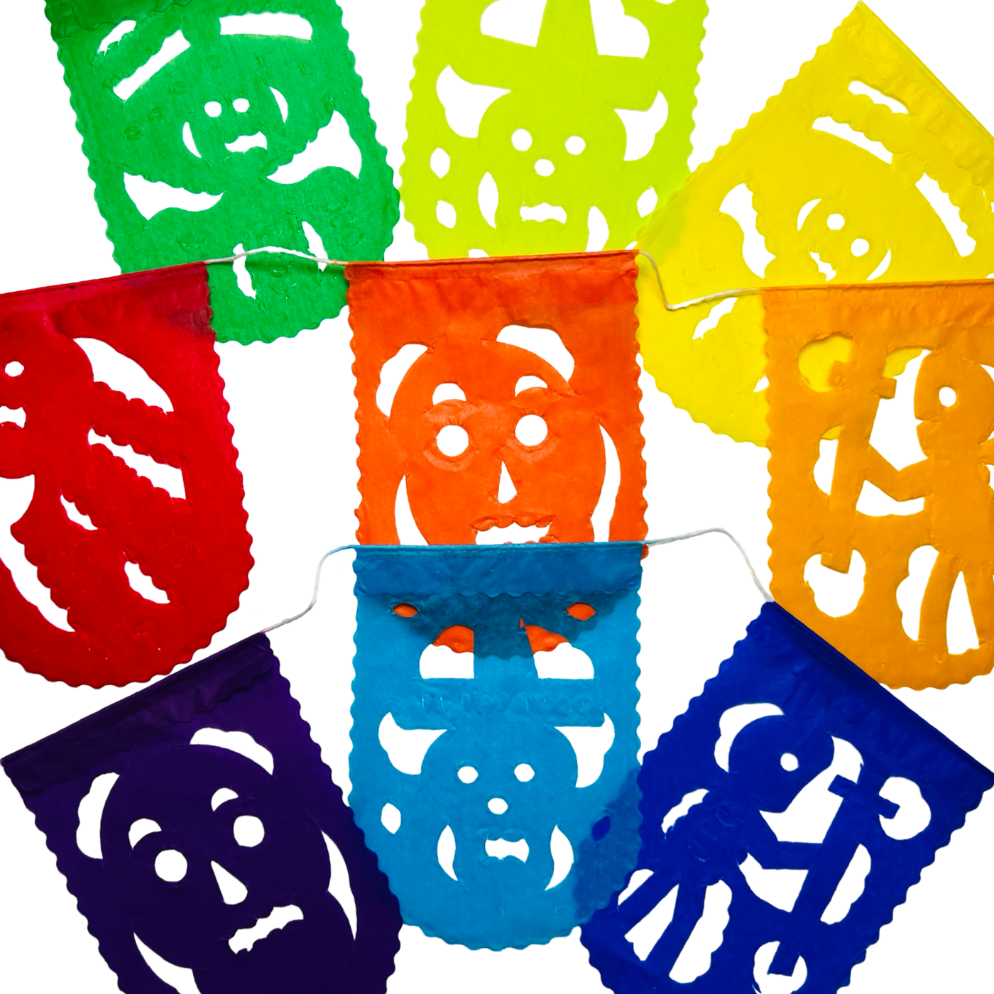 multicolor scalloped papel picado tissue paper flags attached to a white string with various skull designs