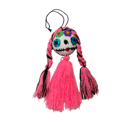 felt calavera ornament with a pink tassel and pink with black braids