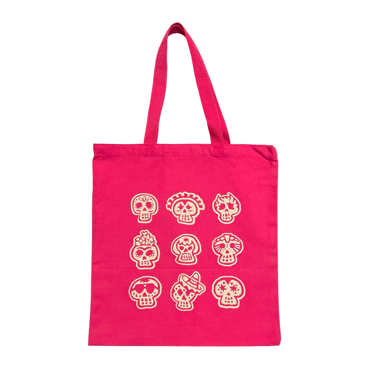 pink tote bag with images of nine various sugar skulls in a cream color.