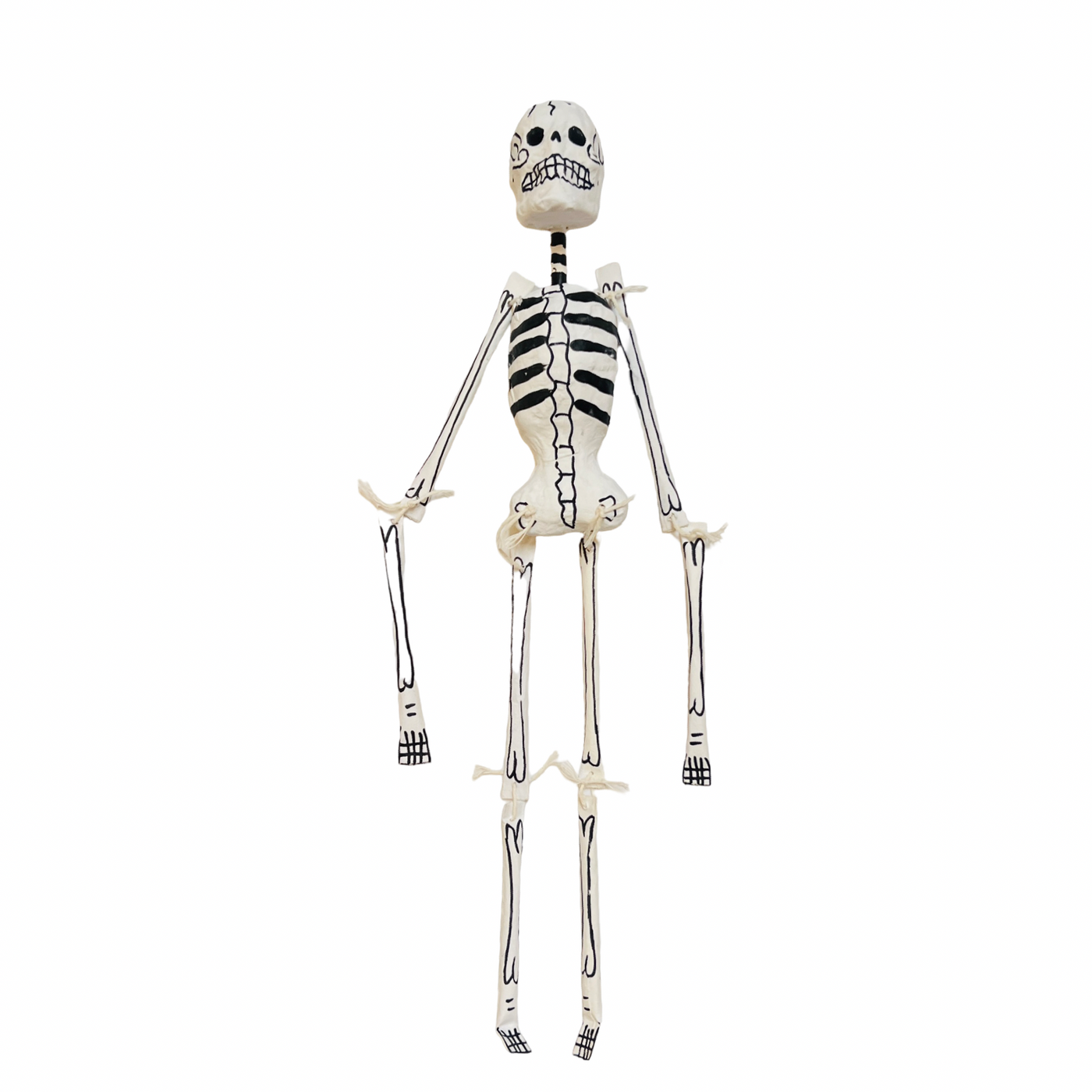 black and white paper mache full body skeleton