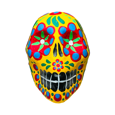 front view of a yellow paper mache sugar skull