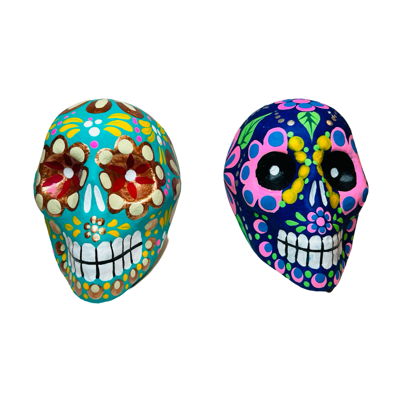 set of paper mache multi-colored sugar skulls