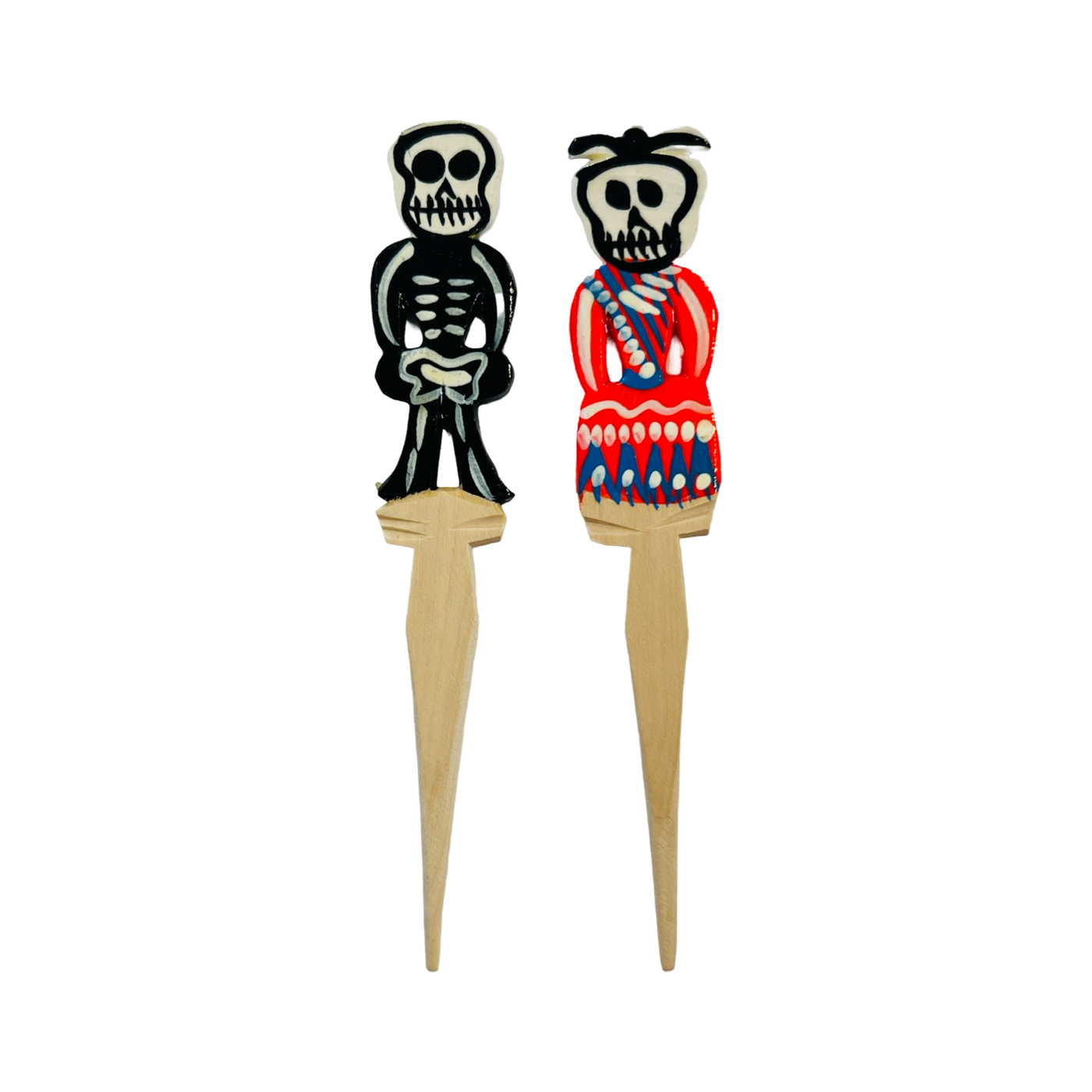 set of skeleton wooden toothpicks with one wearing a dress