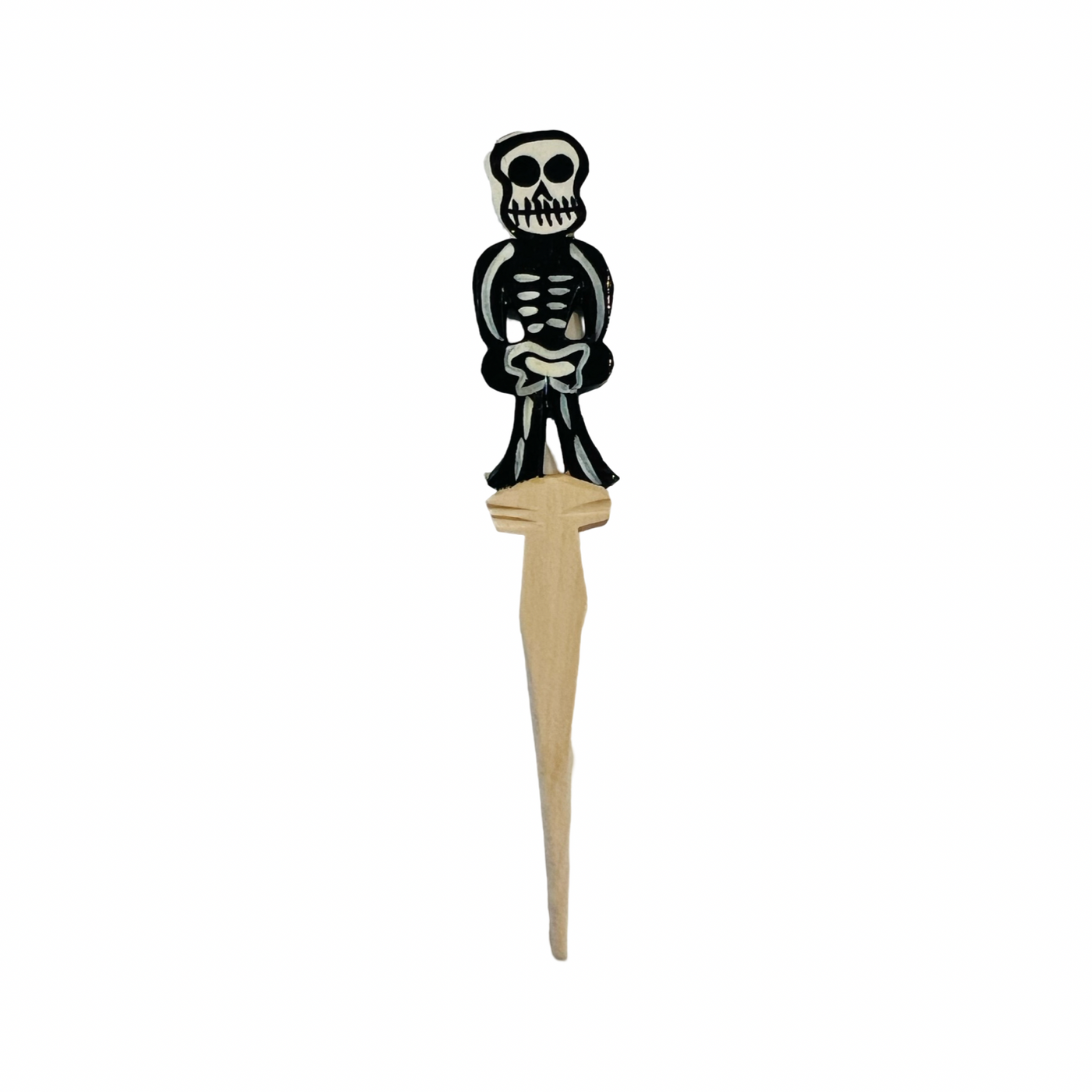 wooden toothpick with a skeleton on the top