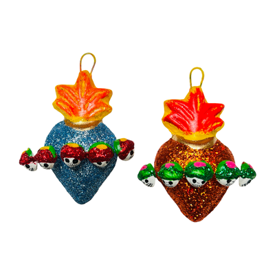 set of multi-colored glitter sacred hearts with Catrina calaveras surrounding it.