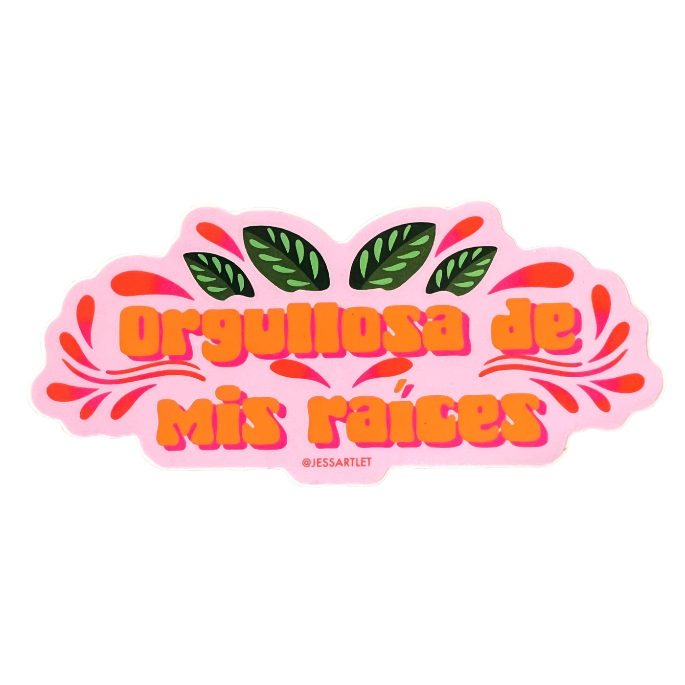 Pink sticker with phrase Orgullosa De Mis Raices in orange lettering.