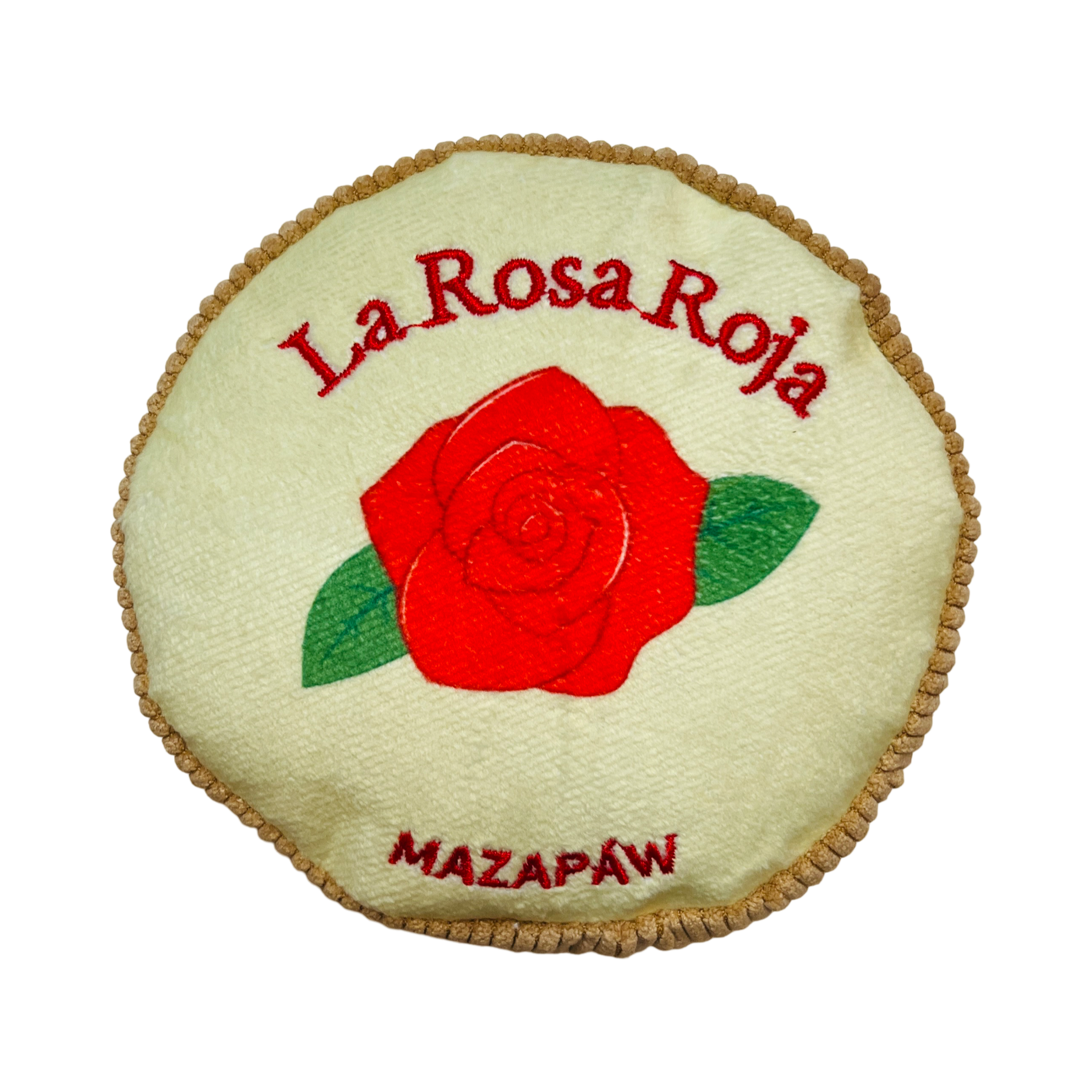 Round mazapan shaped dog toy featuring a red rose in the center and the phrase La Rosa Roja Mazapaw in red lettering. 