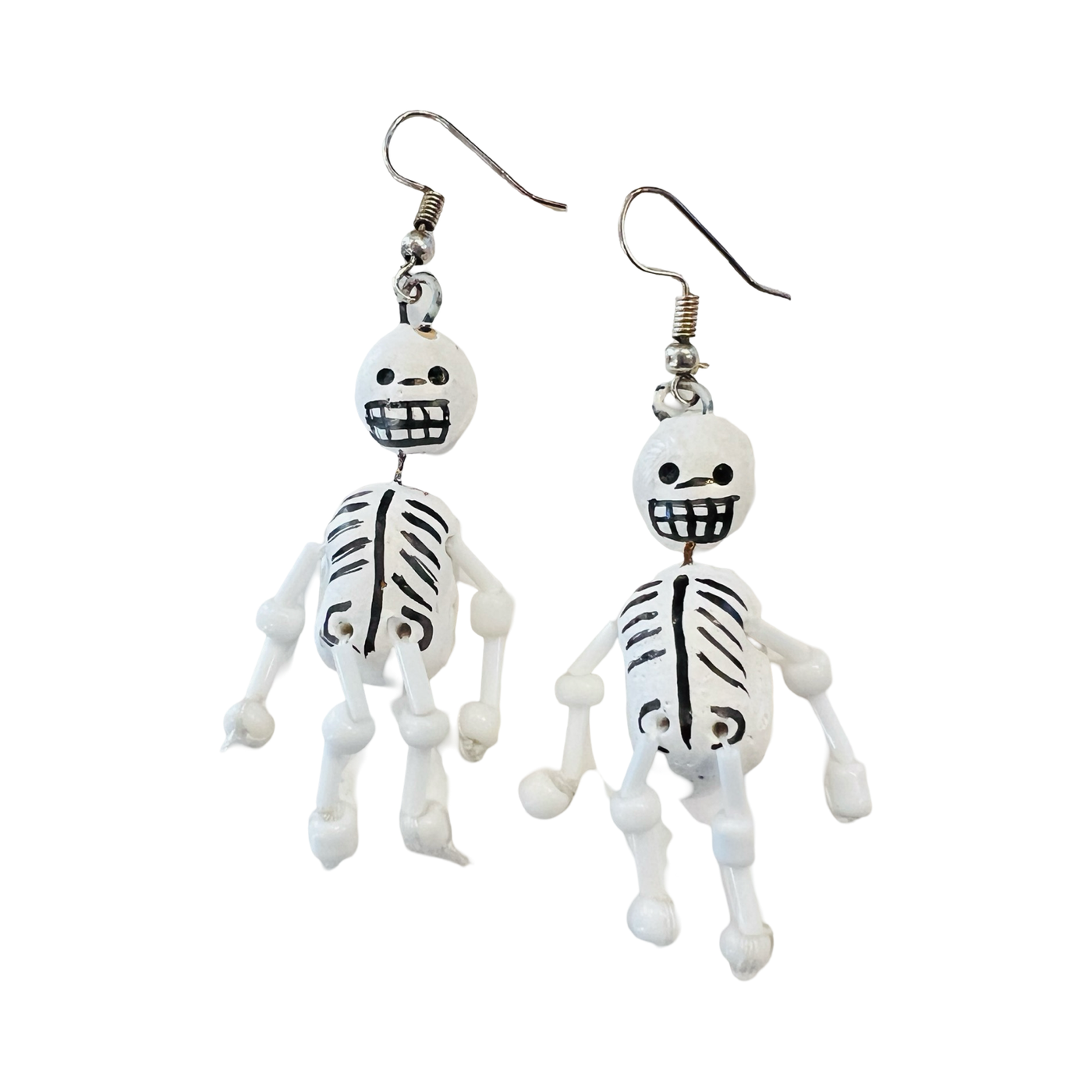 set of white clay skeleton earrings