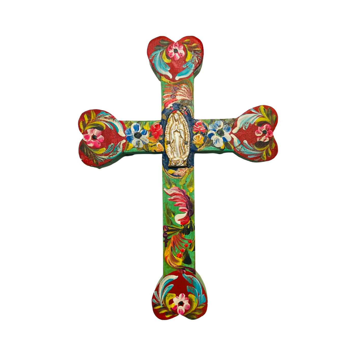 A hand-painted wooden cross adorned with colorful floral designs in shades of red, blue, yellow, and green. At the center of the cross is a depiction of the Virgen de Guadalupe, surrounded by intricate patterns, with heart-shaped ends on each arm of the cross.