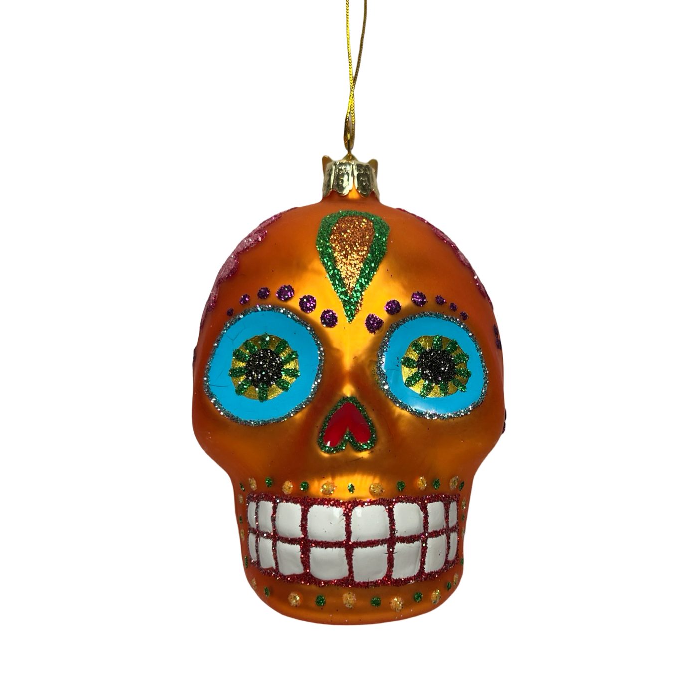 A vibrant orange glass ornament in the shape of a Día de los Muertos sugar skull, featuring intricate glitter designs, colorful floral eye accents, and a cheerful, toothy grin.