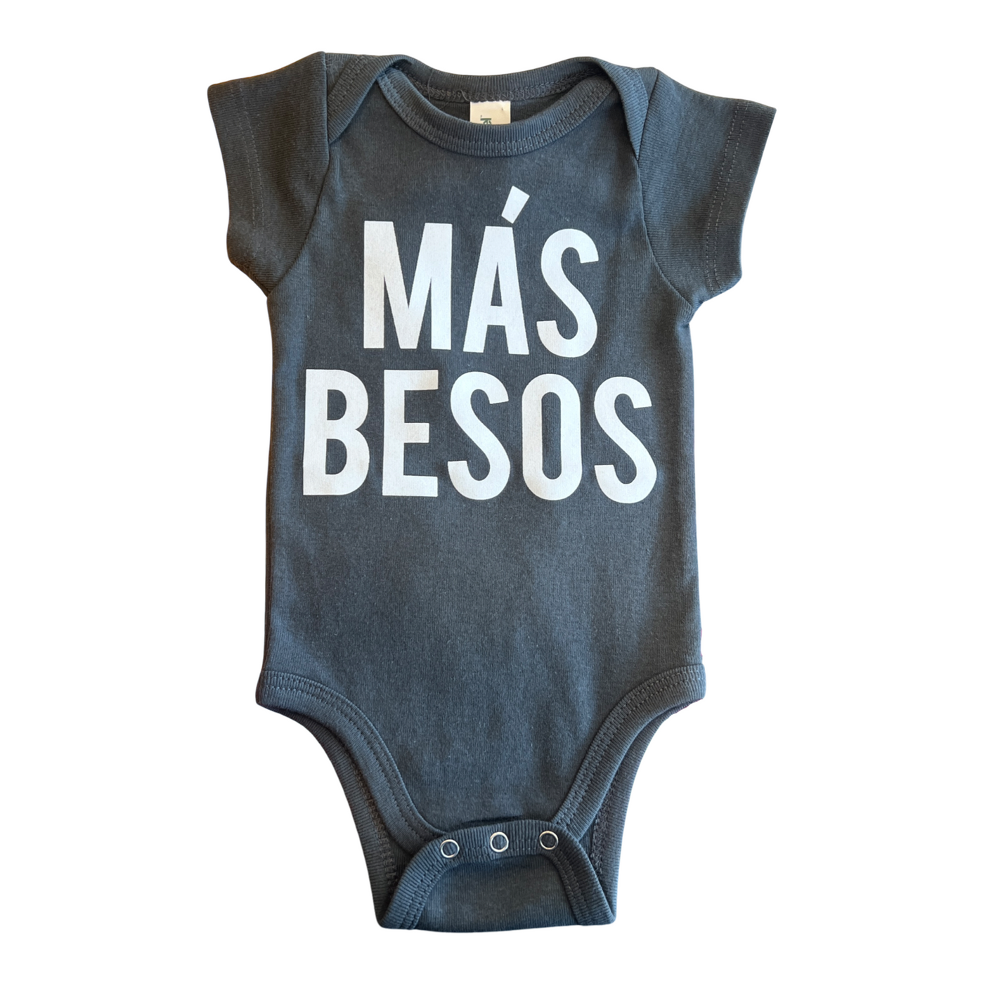 Grey onesie with the phrase Mas Besos in white lettering