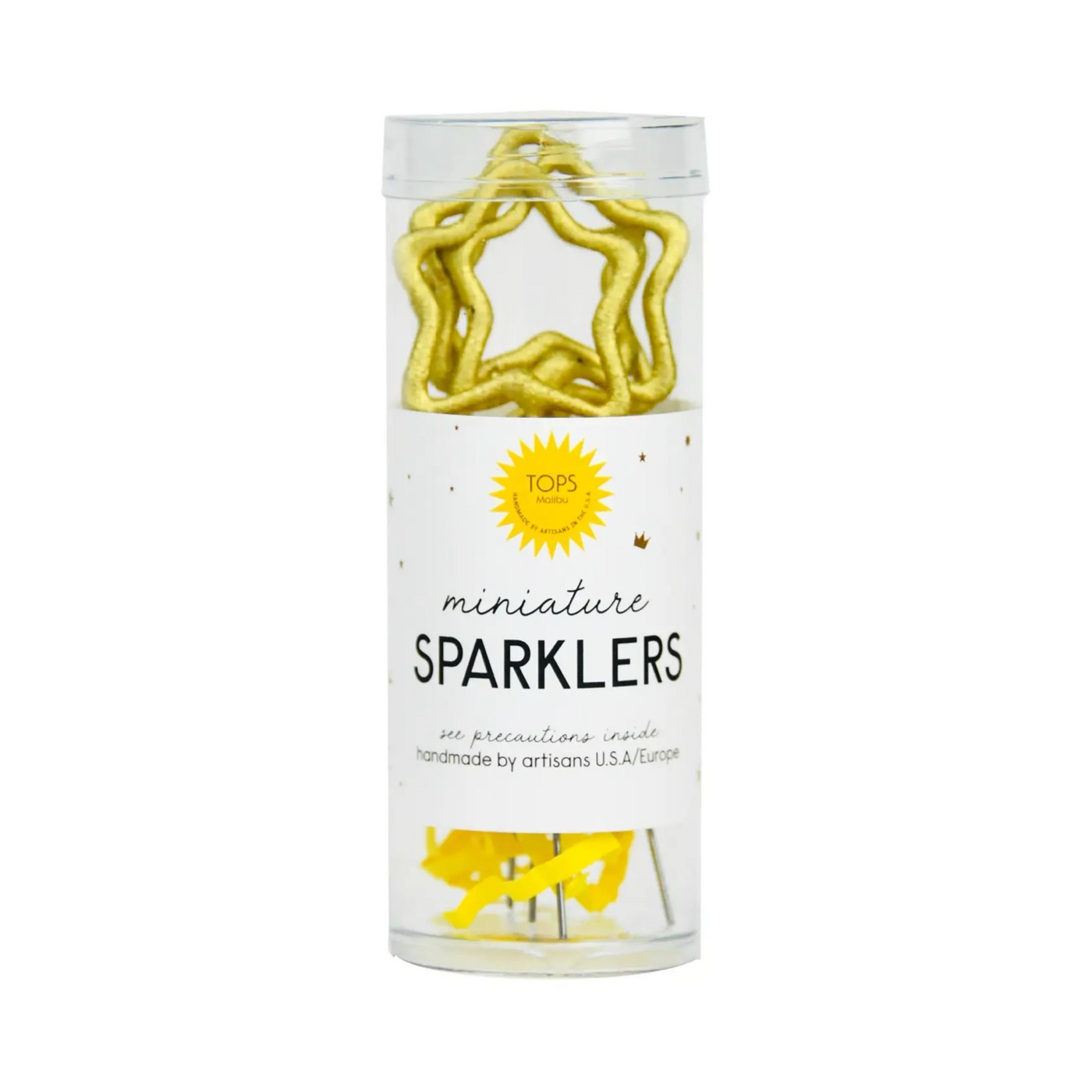 A set of 4 mini gold star sparklers by TOPS Malibu, packaged in a clear cylindrical container with decorative yellow accents. Perfect for celebrations and special occasions.