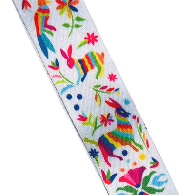 Close up of a white lanyard with an otomi-inspired design
