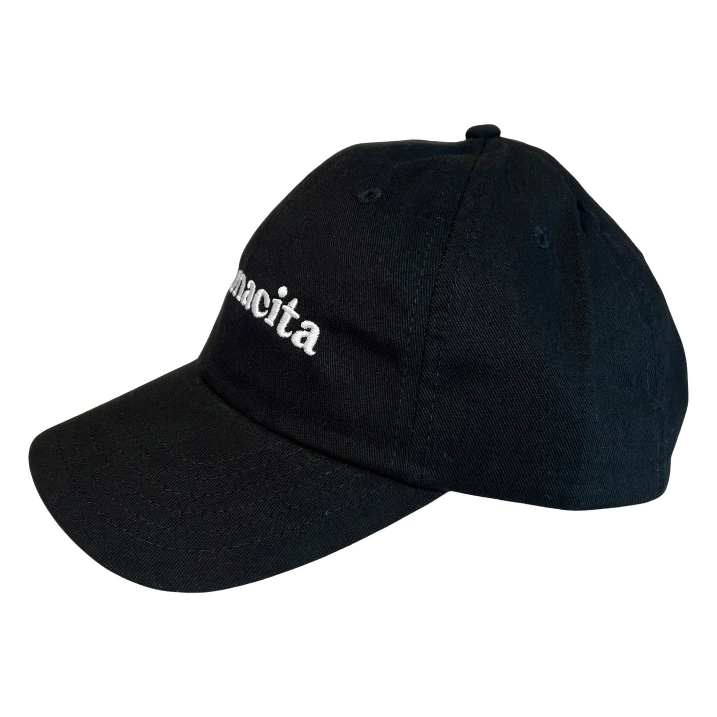 side view of a black hat with the phrase Mamacita in white lettering